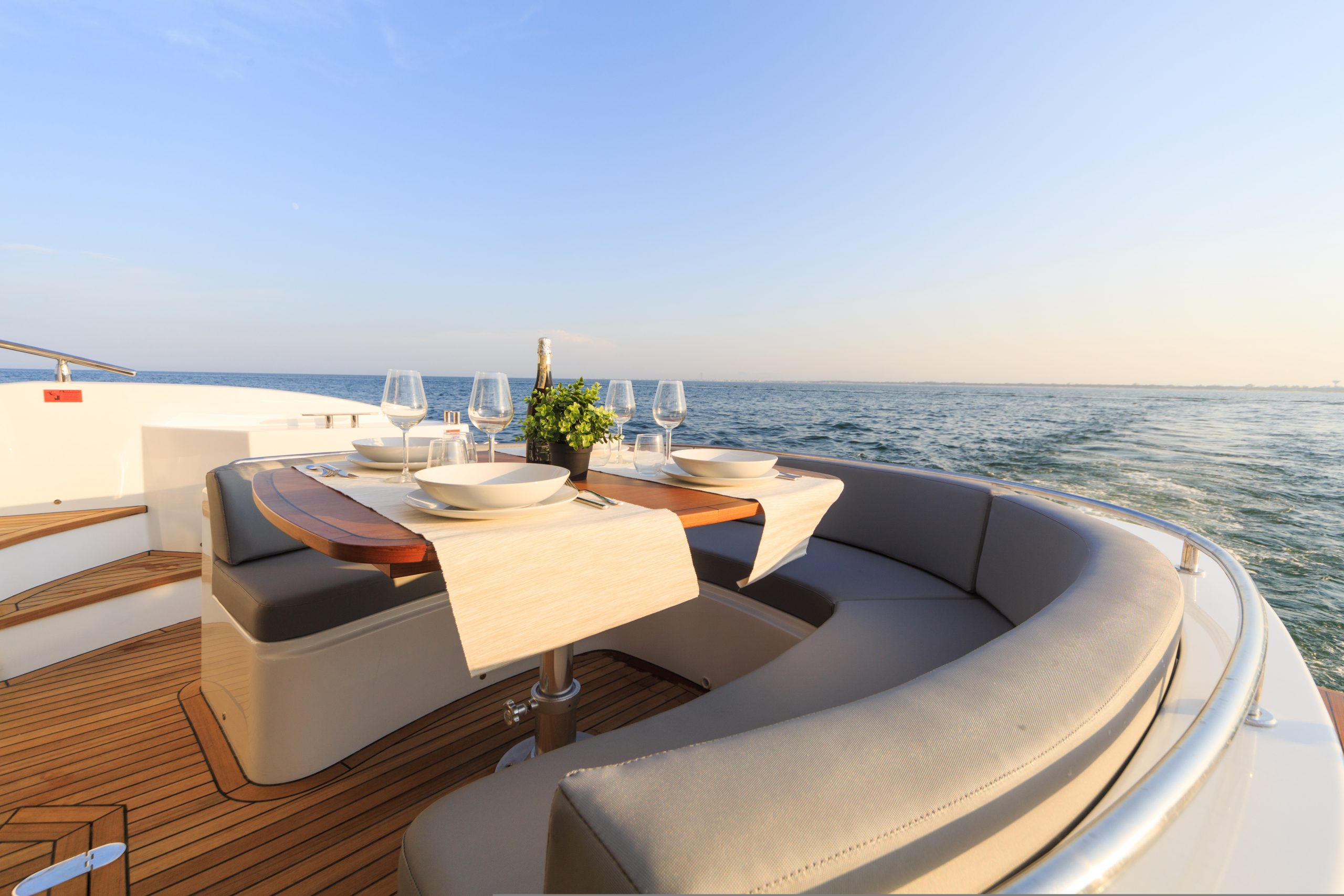 Romantic,Lunch,On,Motor,Yacht,At,Sunset,,Table,Setting,At